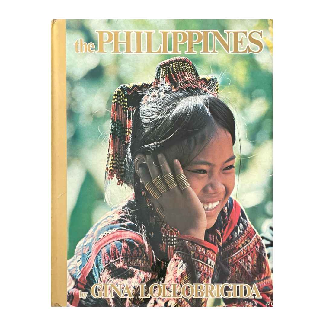 Book cover featuring a woman in traditional attire with 'The Philippines' and 'Gina Lollobrigida' text.